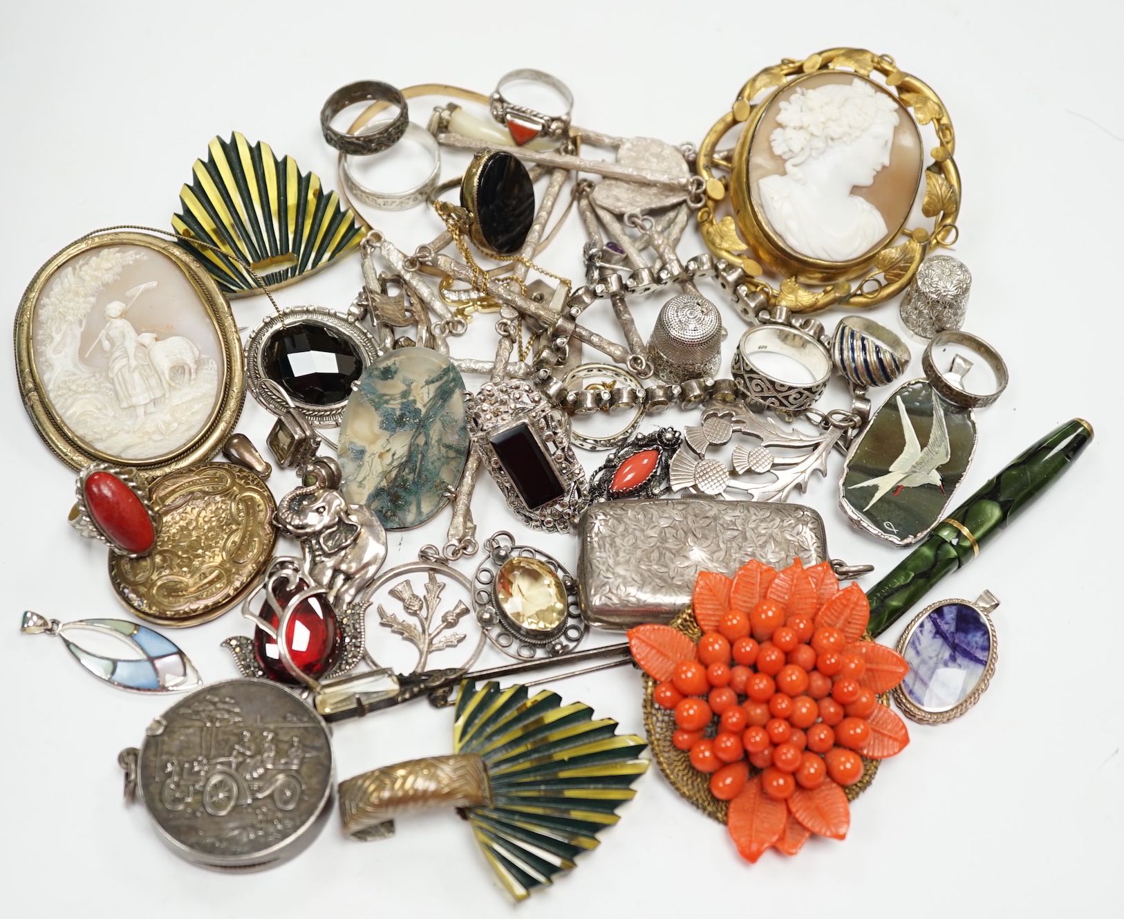 A quantity of assorted mixed silver, jewellery and other items including a sterling and enamel drop pendant, coral, silver brooches, Norwegian sterling and enamel flower brooch, fountain pen, pencils, cufflinks, silver s